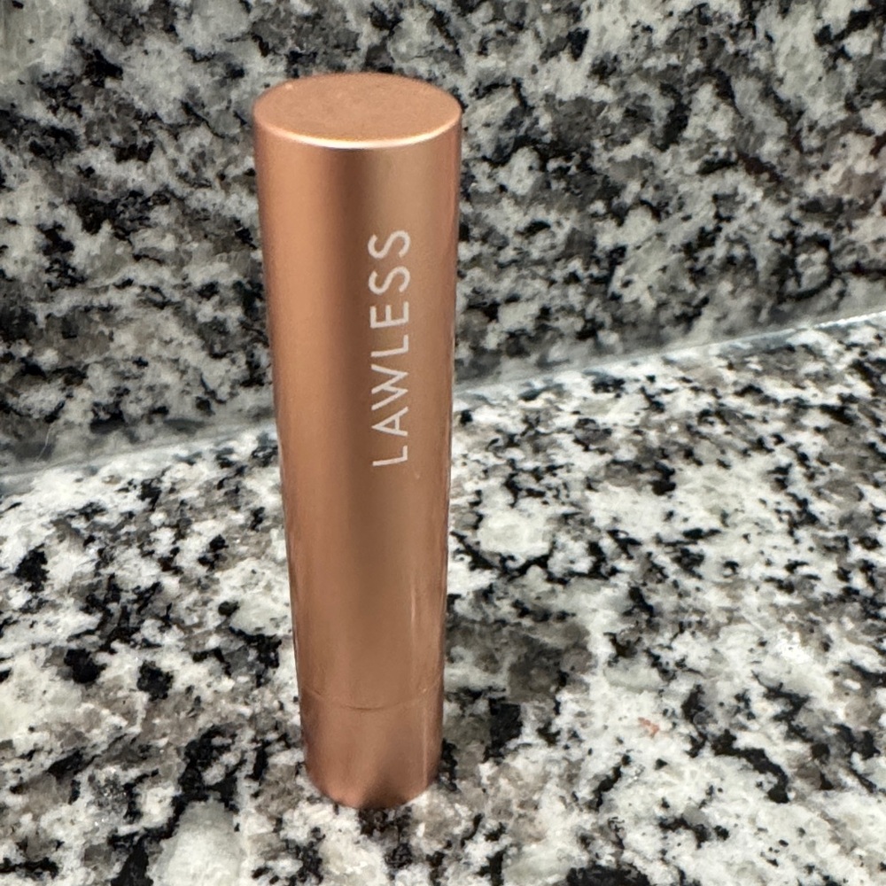 LAWLESS 
Forget the Filler Lip-Plumping Tinted Lip balm